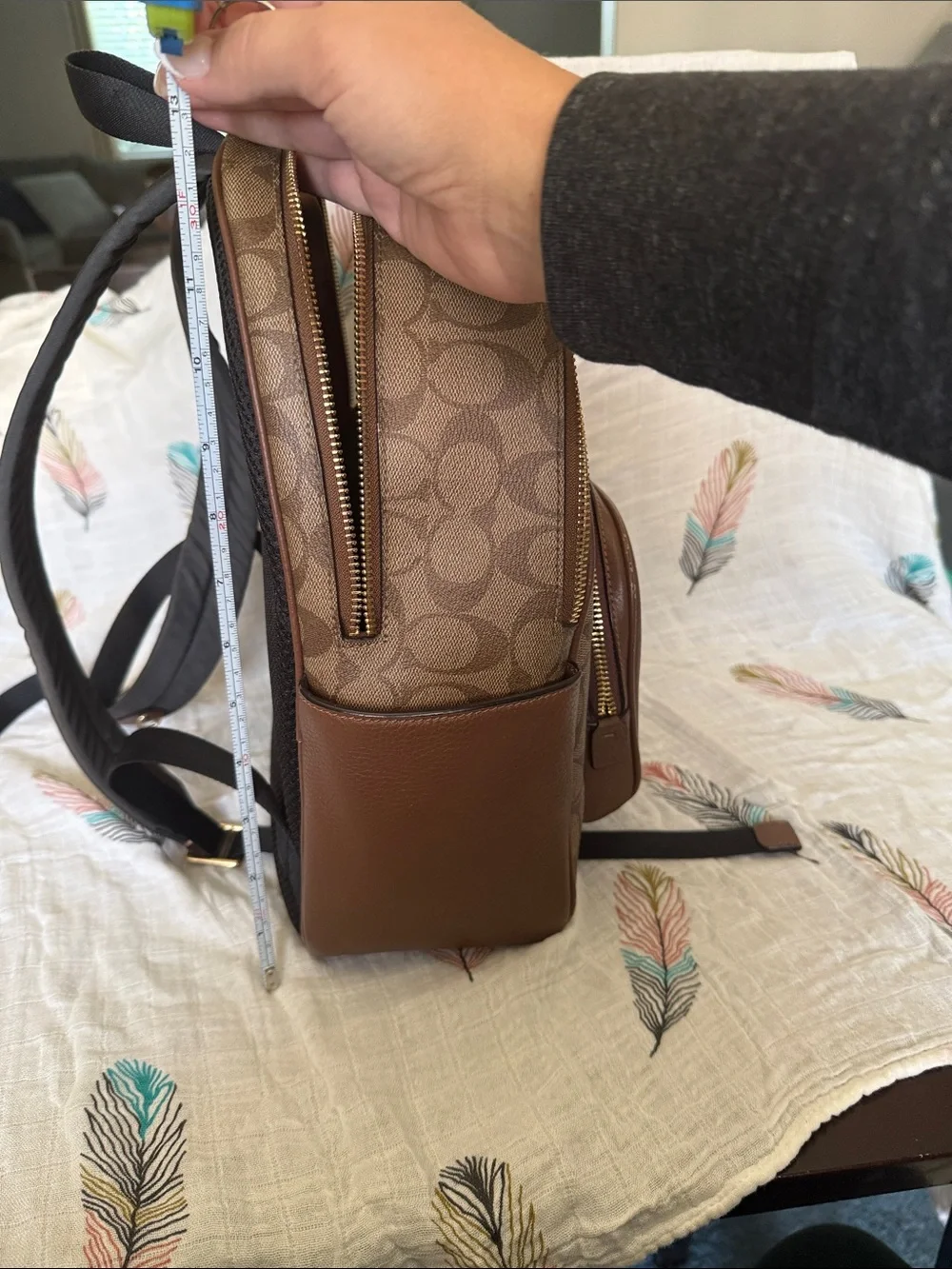 Coach Brown Signature Leather Backpack with gold hardware